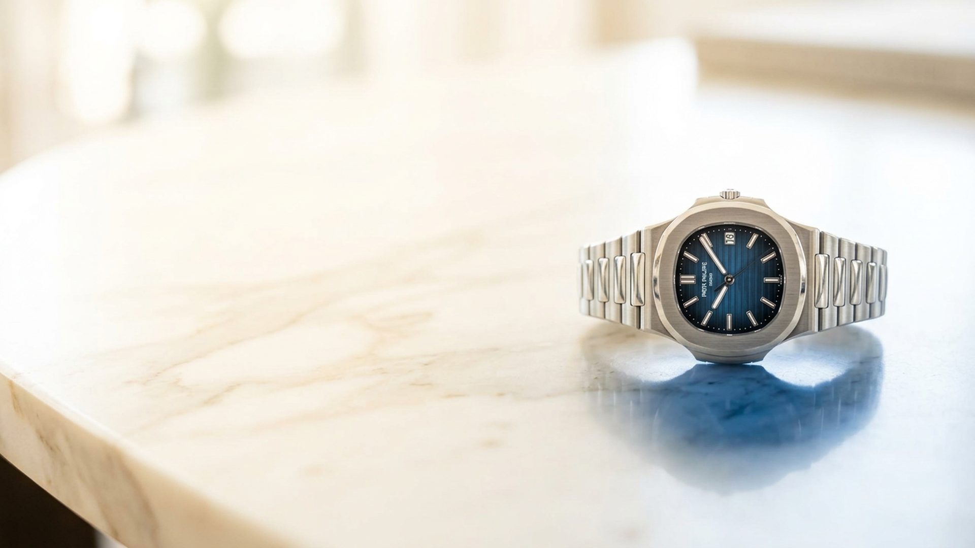 Patek Philippe Nautilus with blue dial in dramatic monochrome light